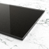 Schwarz metallic lackiertes Floatglas mit SAFE-Folie